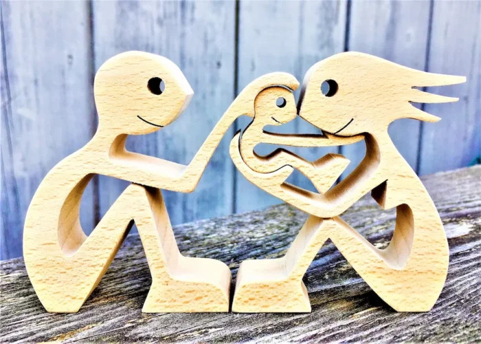 wood sculpture handmade a couple a child