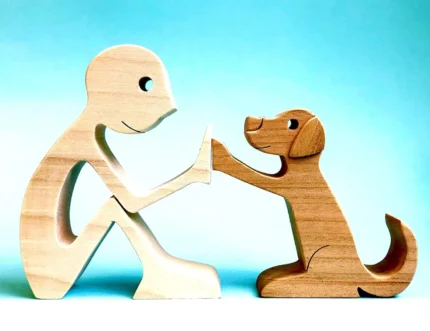 a man seated a dog wooden sculpture Handmade