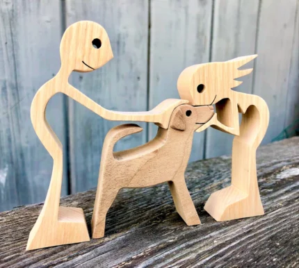 couple a dog wood sculpture